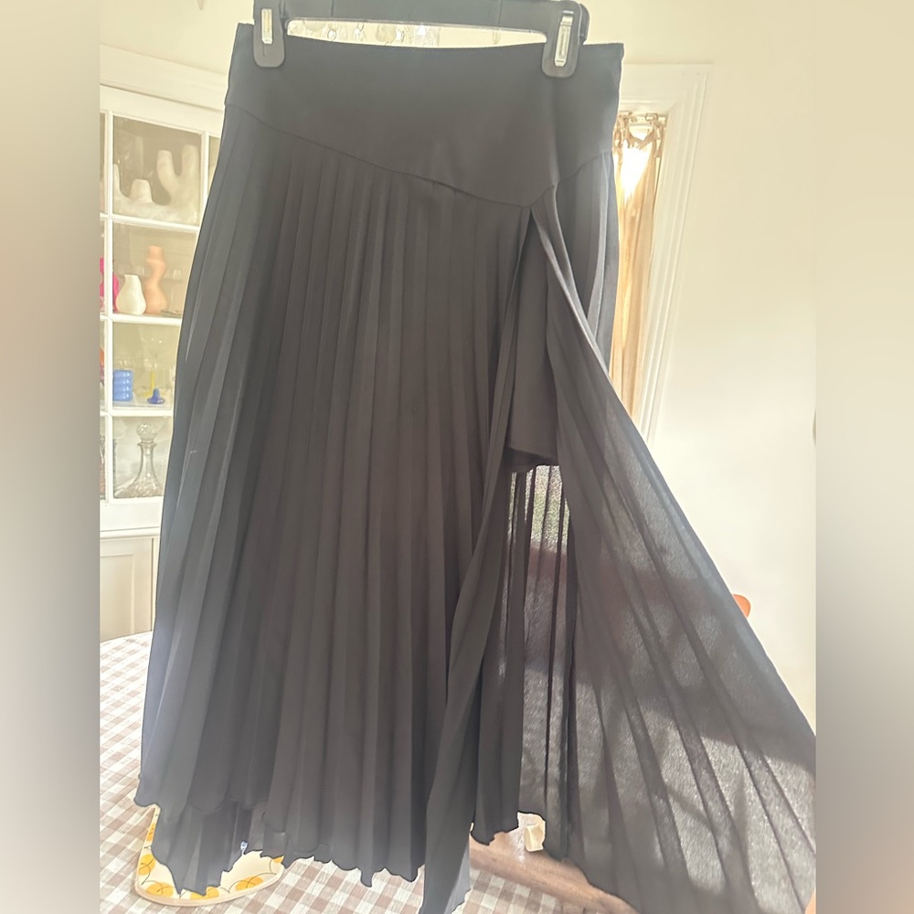Elegant Black Pleated Skirt with built in shorts
